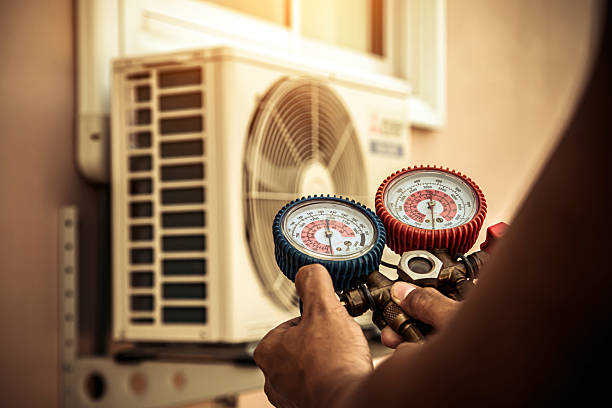 Professional Hvac technician working in Marion, MS